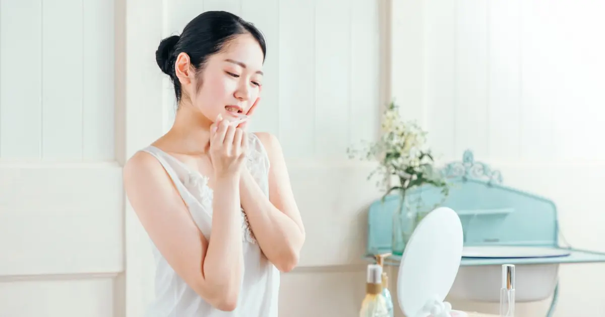 歯石取りを痛がる女性